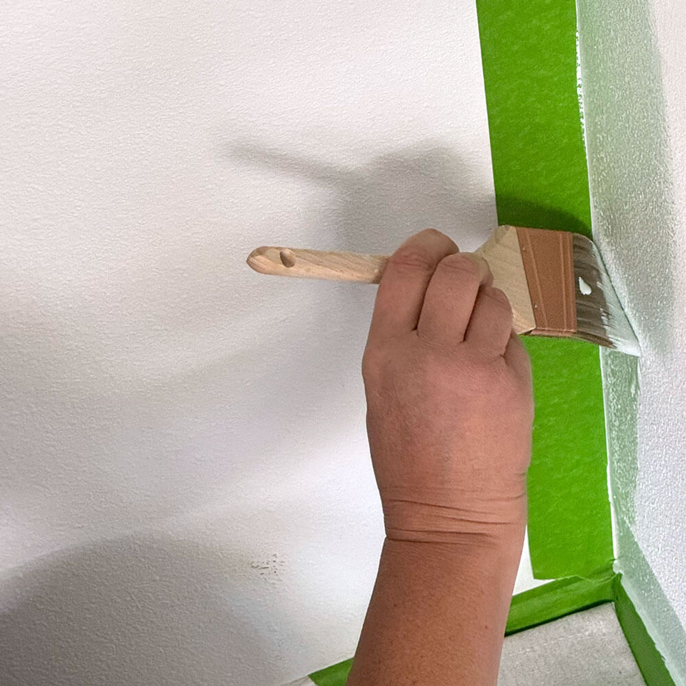 Painting the left edge of the wall
