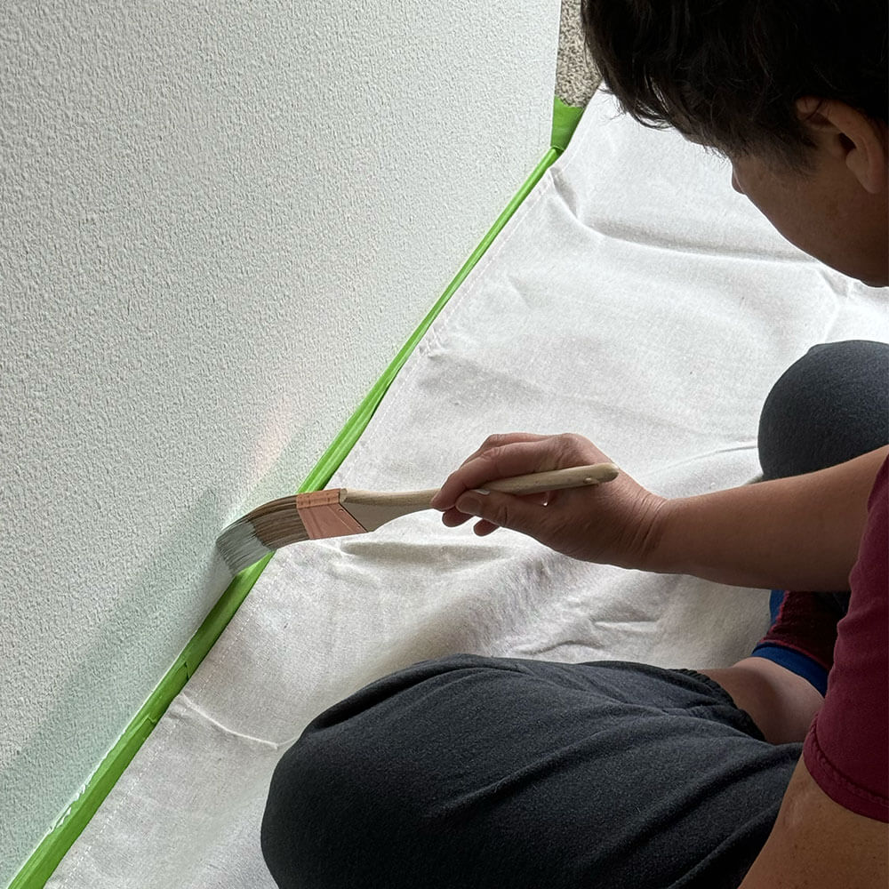 Painting the lower edge near the baseboards