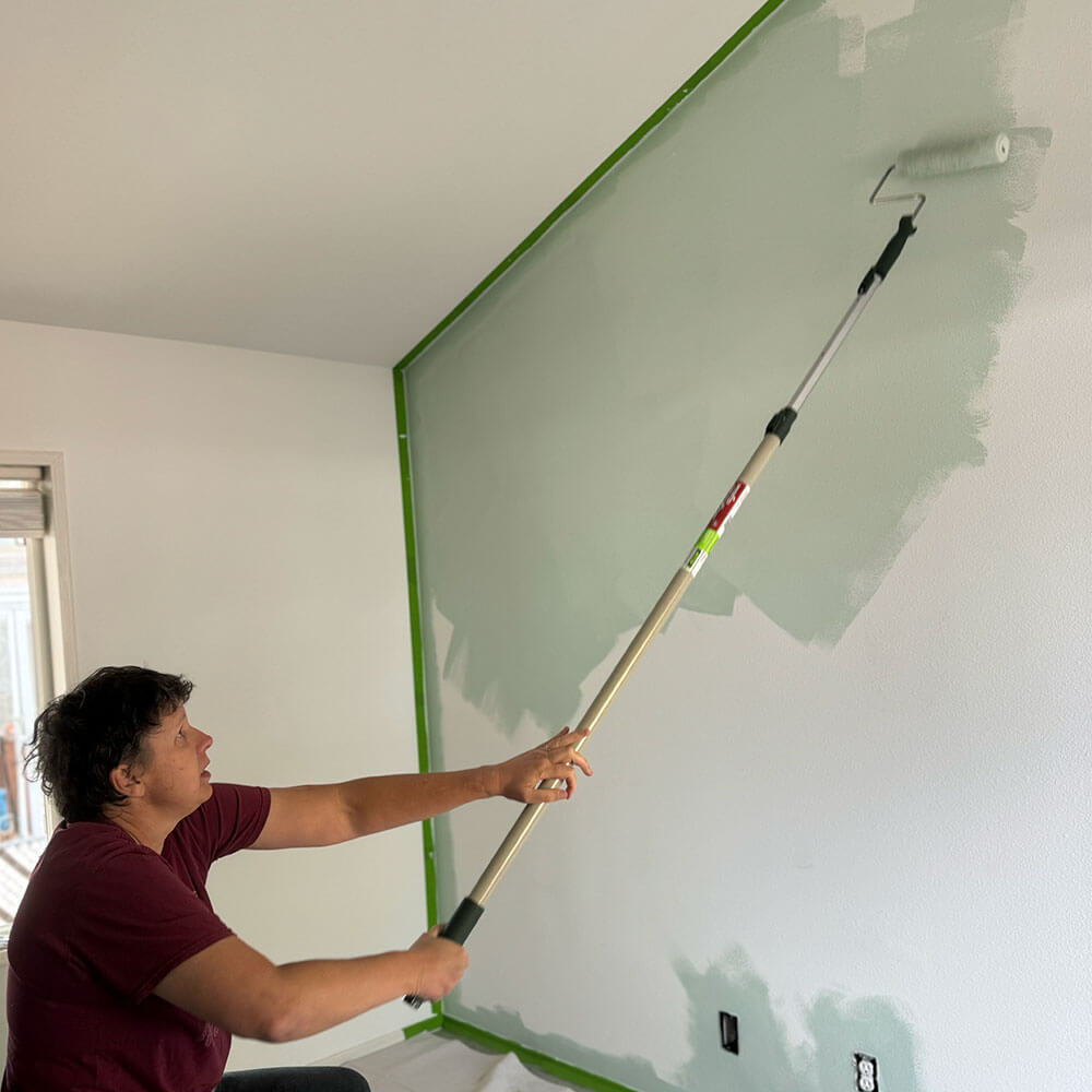 Painting on the wall in a W motion.