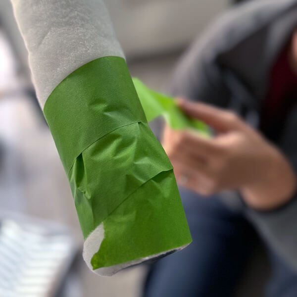Removing the fuzz from a paint roller