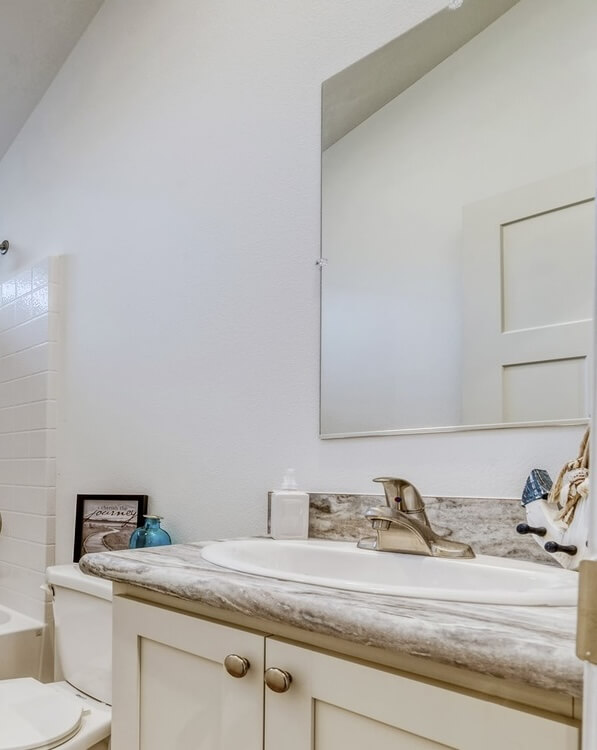 Plain Bathroom Wall Mirror over sink.