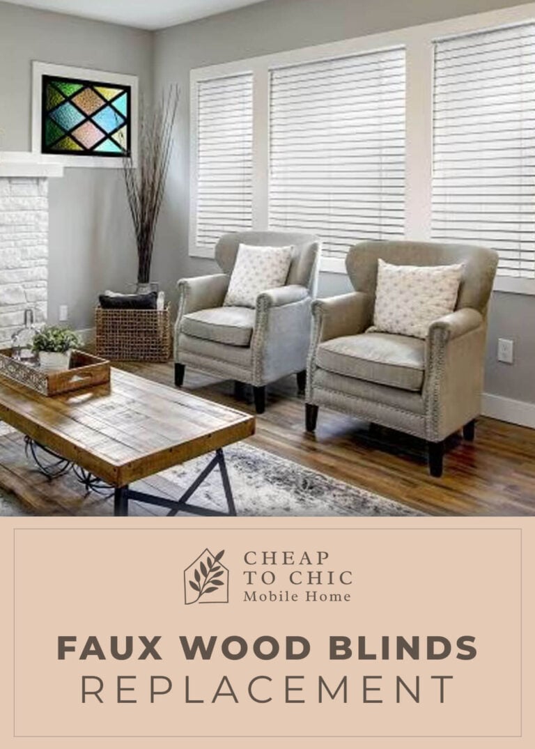 Faux Wood Blinds hanging in living room window with other furniture shown